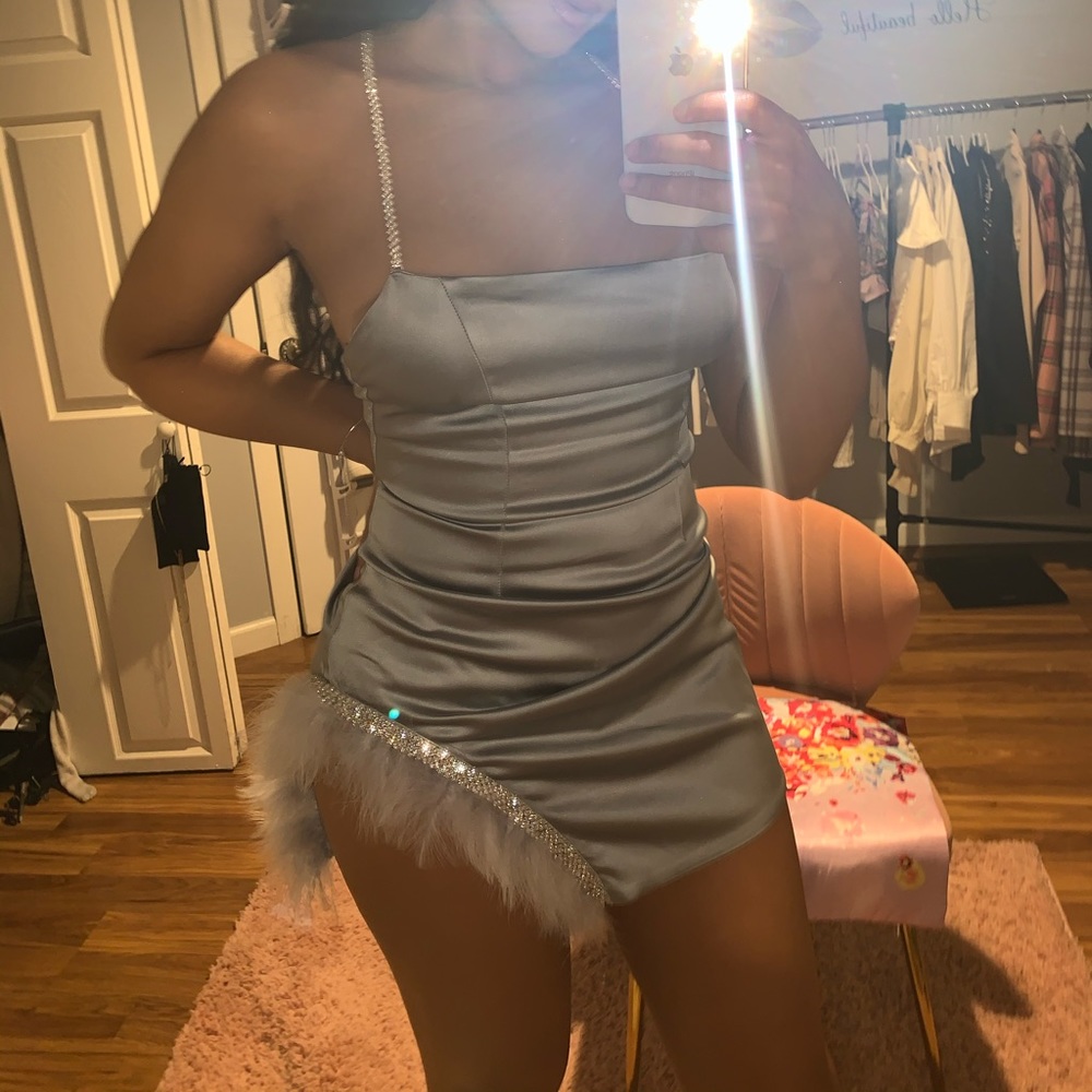 Silver, feathered, mini dress with diamanté’s